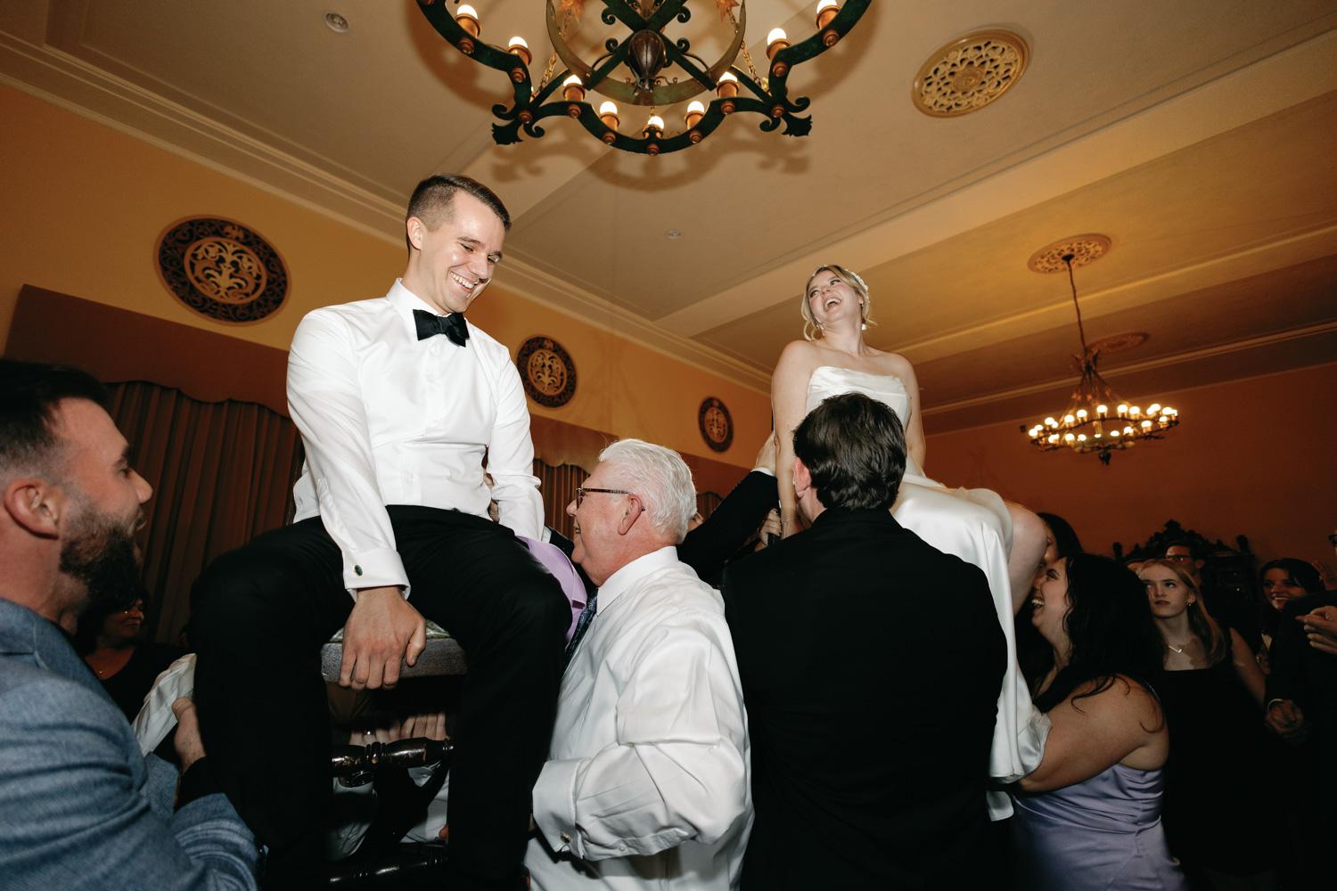 Jewish bride and groom enjoy the Hora dance during their Los Angeles wedding celebration